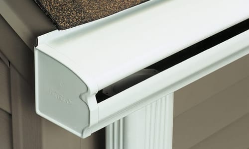All-in-one gutter and debris-shedding system