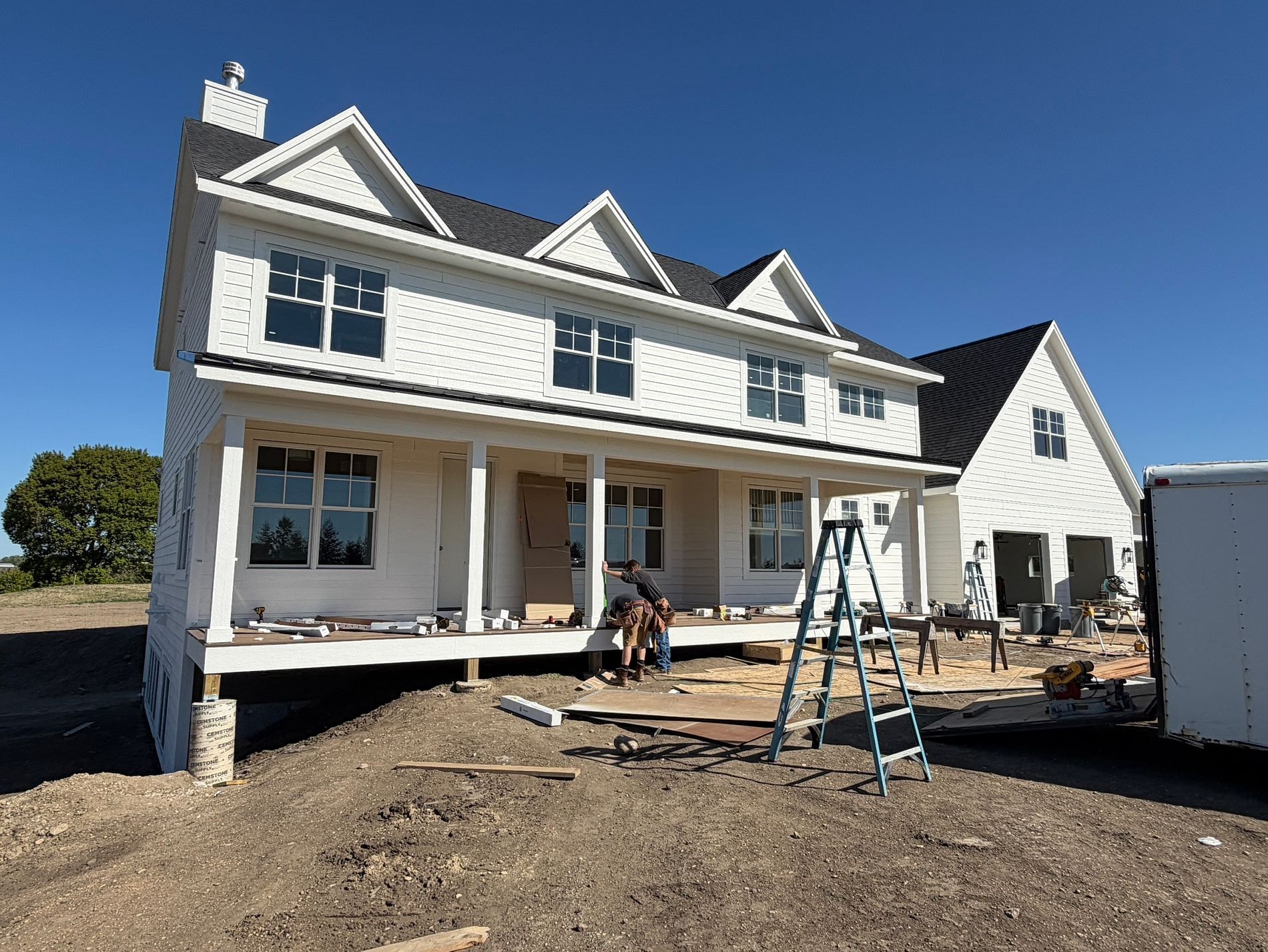 Finished White Siding — Final Stages